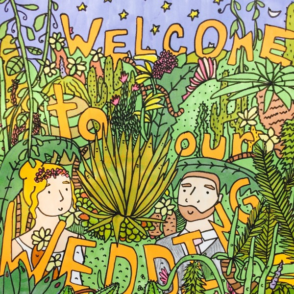Bride and groom in South African inspired flora with text that reads "Welcome to Our Wedding"