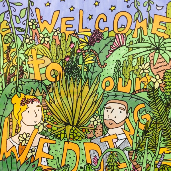 Bride and groom in South African inspired flora with text that reads "Welcome to Our Wedding"