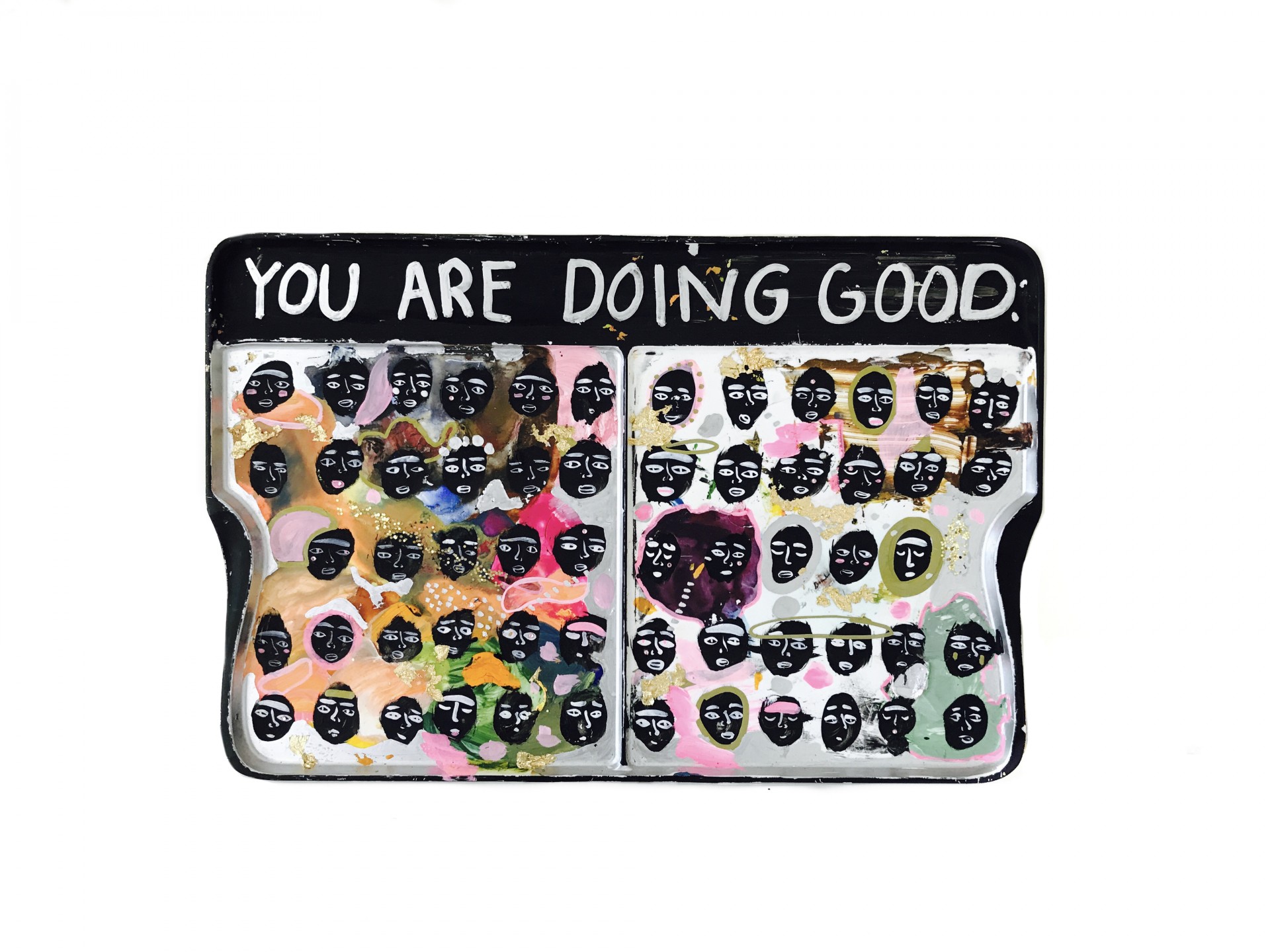 Rectangular palette. Text on top of painting reads "You Are Doing Good" Grid of faces painted in black with various emotions. 